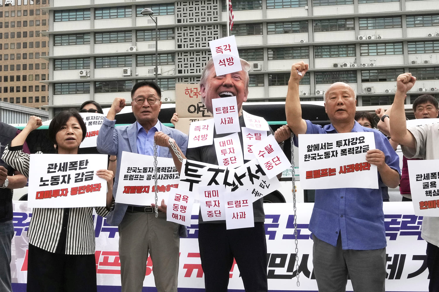 Workers detained in immigration raid head home to a reeling South Korea