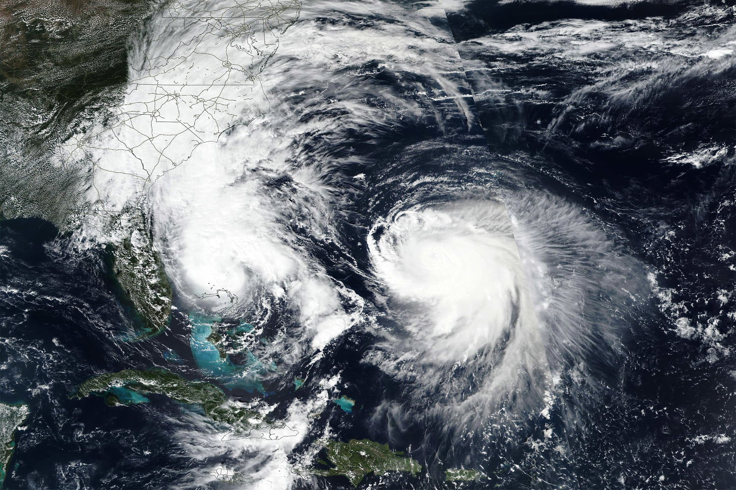 The Carolinas brace for heavy rain as dual hurricanes barrel north through the Atlantic