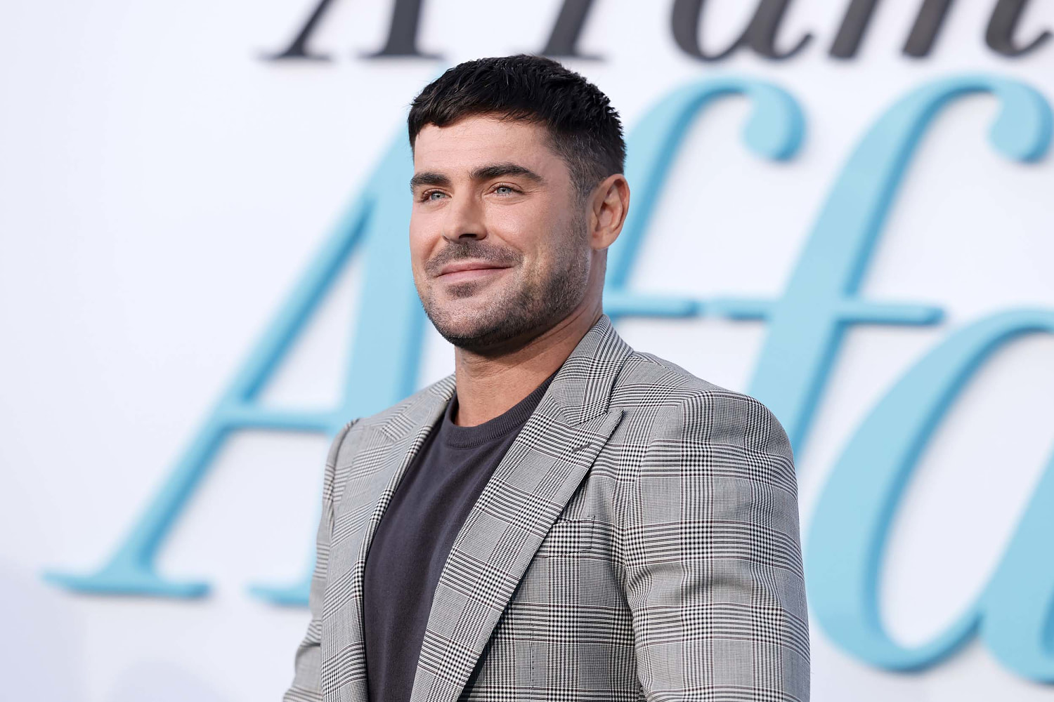 Zac Efron Steps Out With Platinum Blond Hair on Vacation With Friends