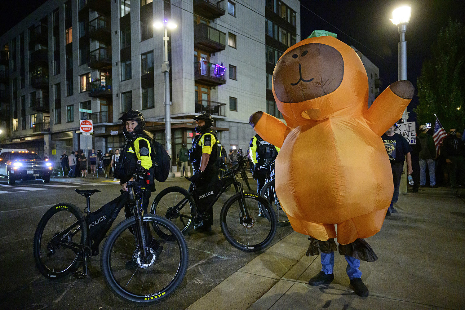 Costumed protesters in Portland defy description of the city as a 'war zone'