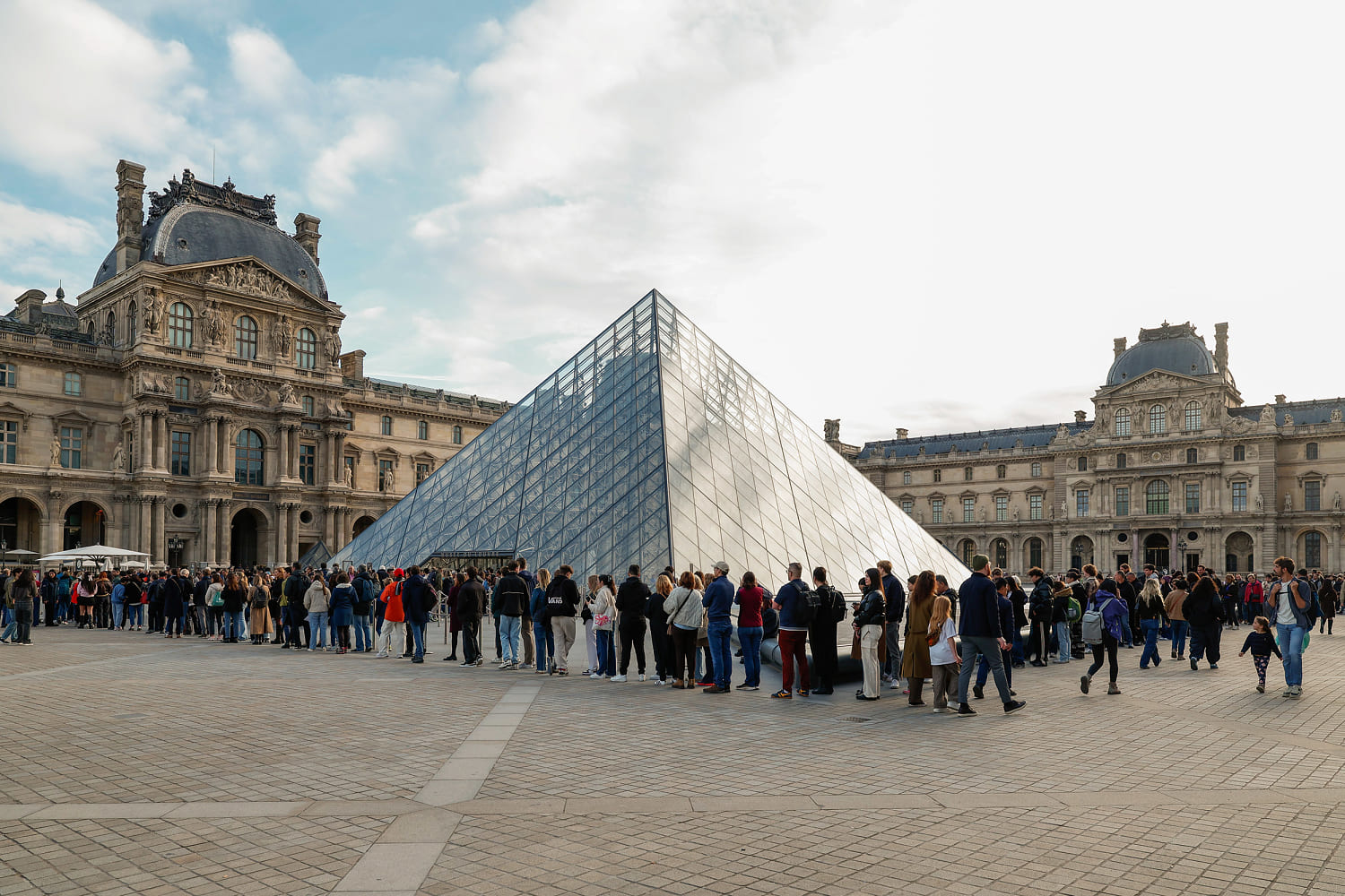 Louvre reopens after jewel heist with thieves still on the run
