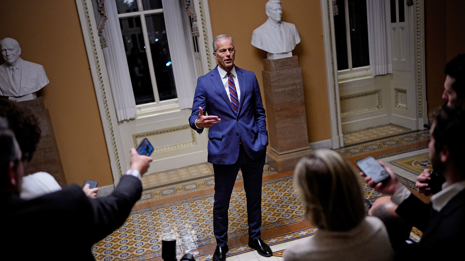 Senate passes bill to reopen the government, as 8 Democrats break with their party