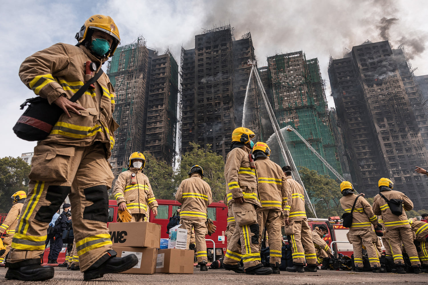 83 dead and dozens still missing in Hong Kong high-rise inferno
