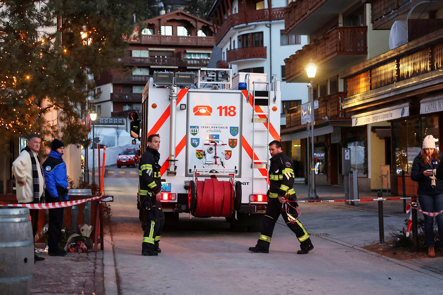 Sparklers atop bottles appeared to start Swiss bar fire, officials say