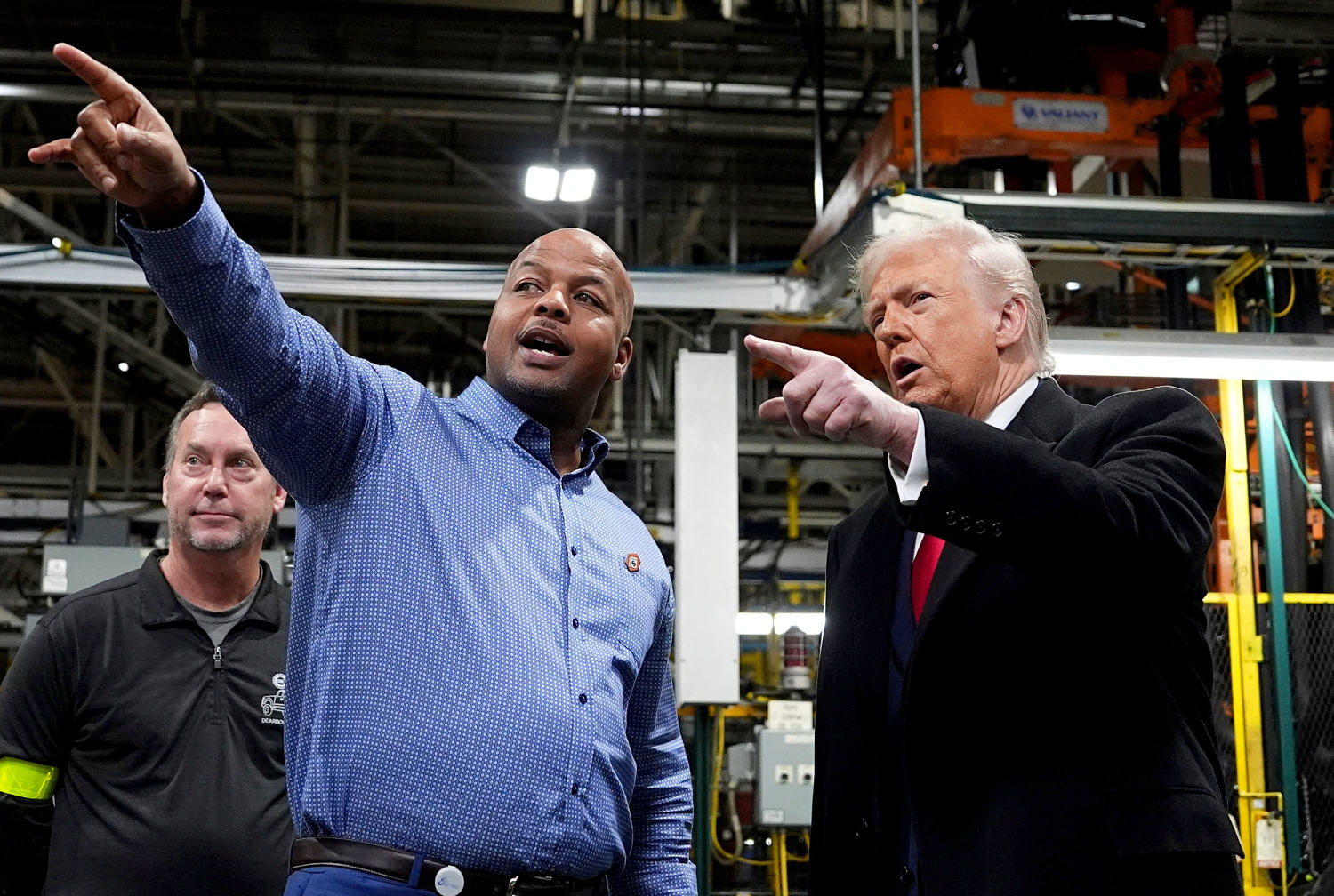 Trump flips off apparent heckler while touring Ford factory