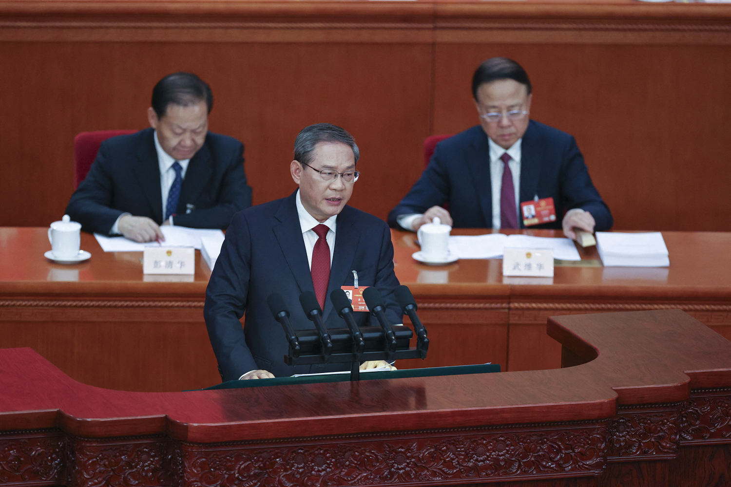 China sets lowest growth target since 1991 as economy struggles to keep momentum