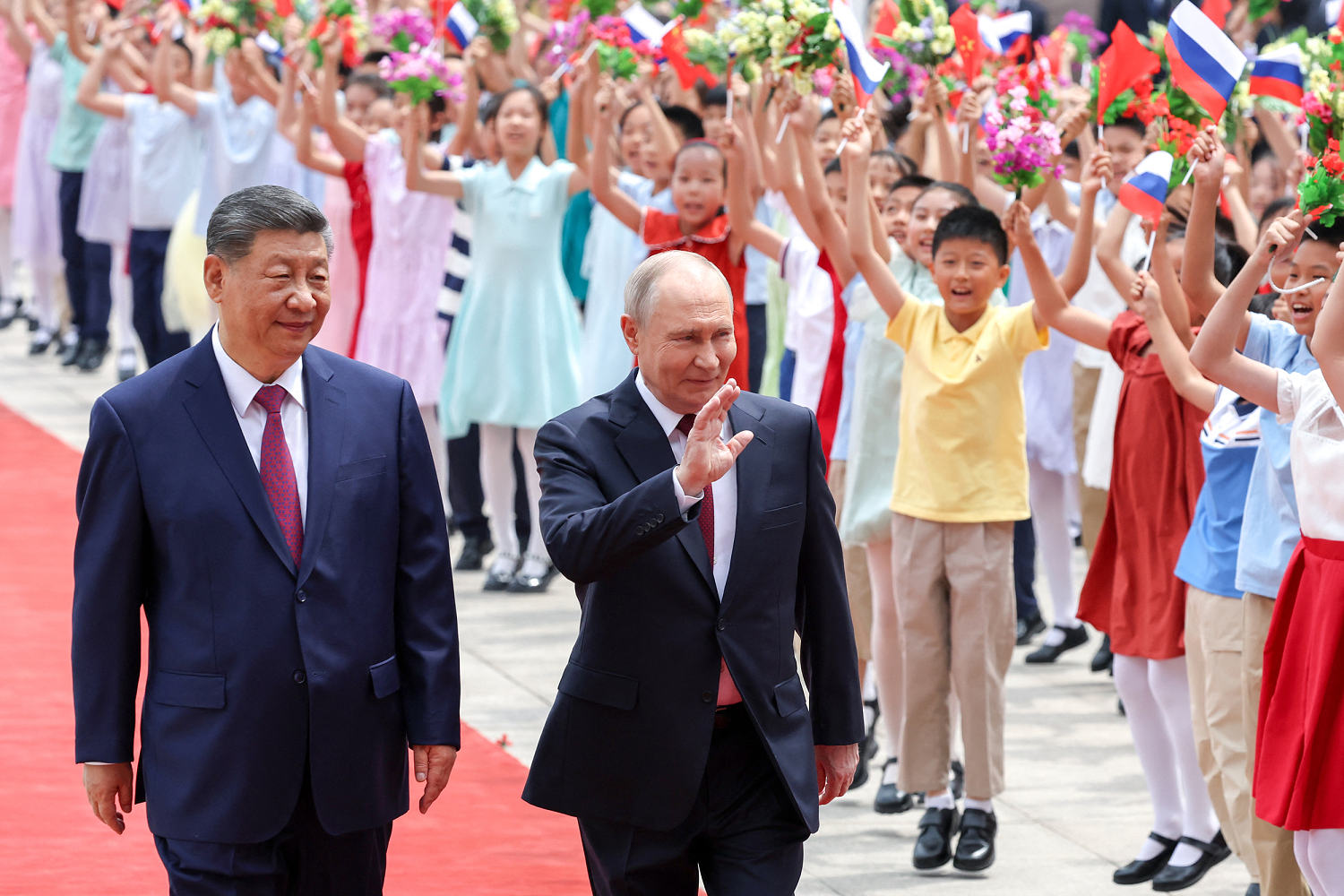 Putin and Xi say ties are at ‘unprecedented’ high at friendly summit after Trump visit