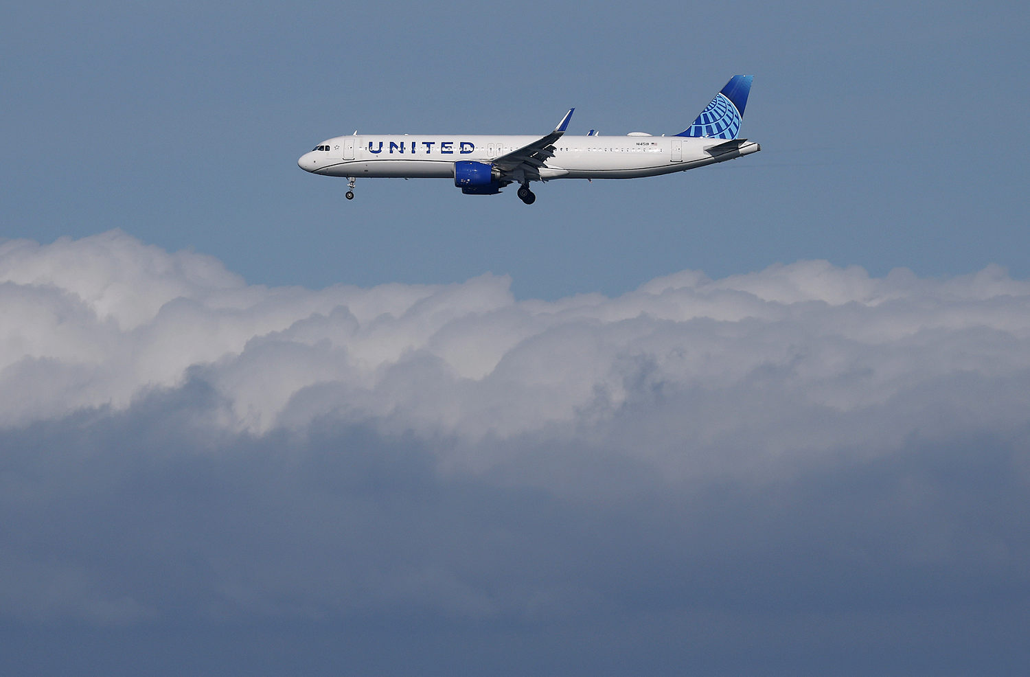 United flight rerouted after passenger tries to open door at 36,000 feet