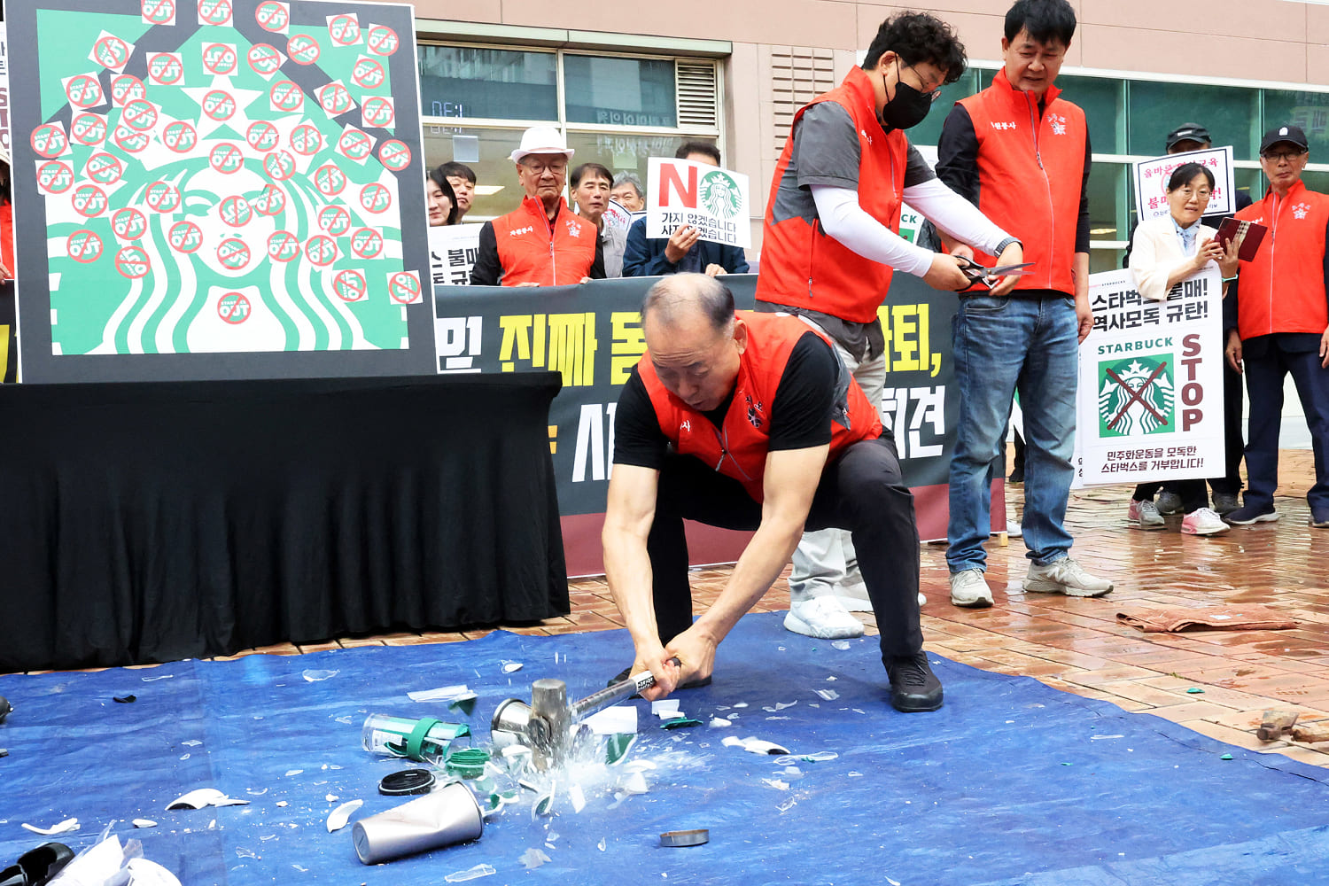 Starbucks struggles to quell outrage over ‘Tank Day’ ad campaign that evoked massacre in South Korea