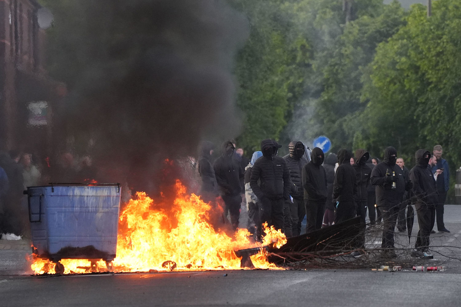 Violent anti-immigrant protests flare up across Belfast afte
