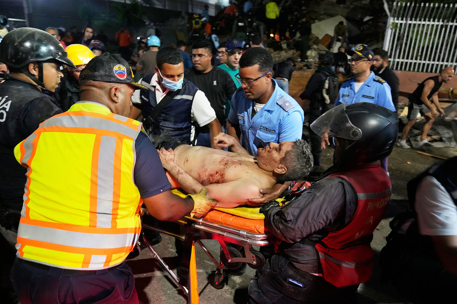 Videos show people trapped under debris, including children, pulled to safety after twin earthquakes hit Venezuela