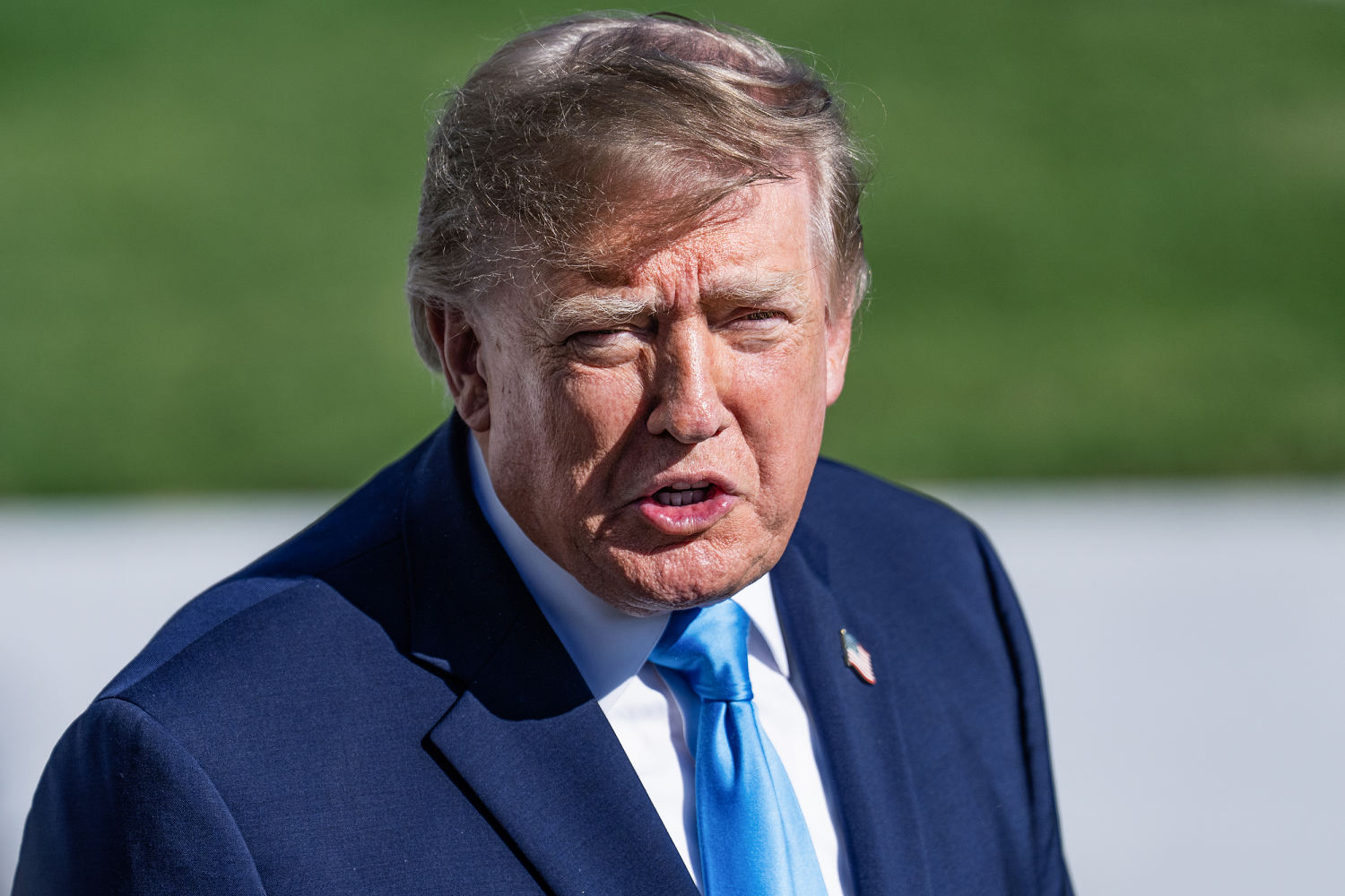 After bipartisan criticism, Trump says taxpayers dollars will no longer be used for TV ads promoting him