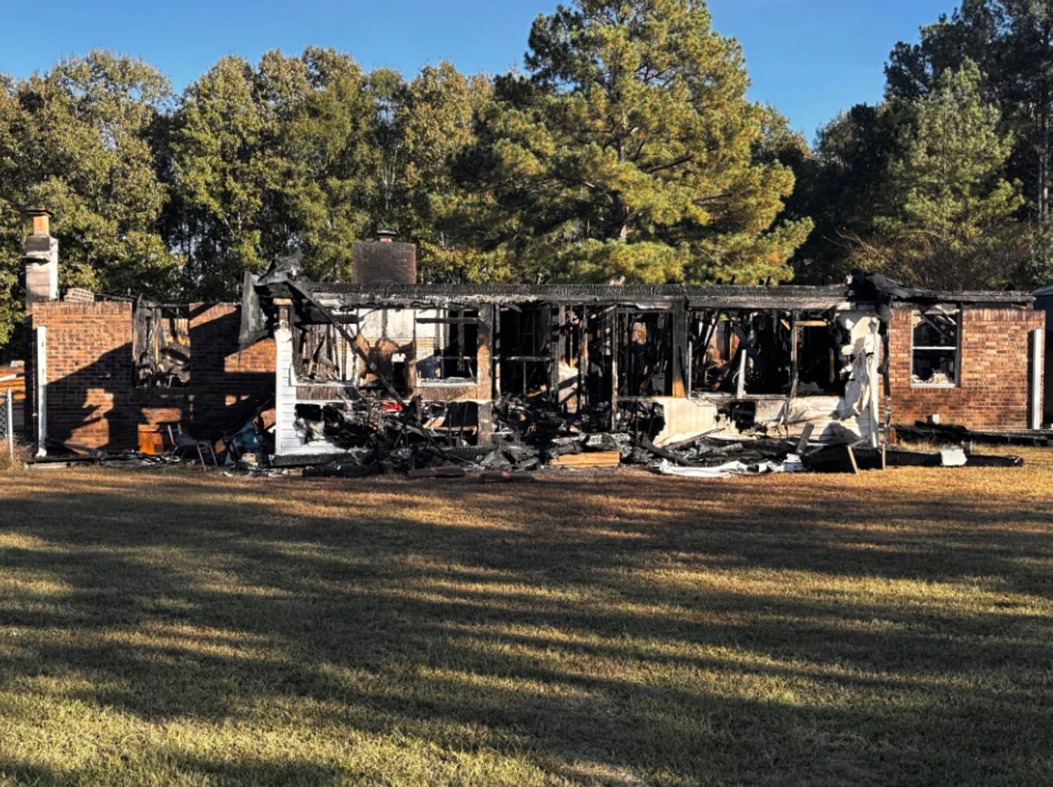 Motorist led astray by GPS in Georgia stumbles upon house fire and saves sleeping family of 14