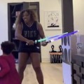 Serena Williams shares video of lightsaber battle with daughter Olympia
