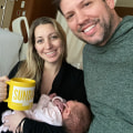 Parents and their newborn baby celebrate new life with a Sunday Mug