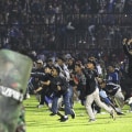 Massive stampede after Indonesian soccer match leaves 174 dead
