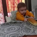 Hungry toddler devises clever way to retrieve a loaf of bread