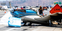 Caught on camera: Small plane crash lands on California highway