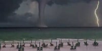 Watch: Lightning strikes as massive funnel cloud forms in Florida