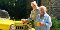 Couple stars in Sunday Mug shot alongside their vintage Jeepster