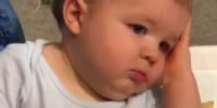 Watch: Boy rocks out but baby brother is not at all impressed