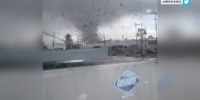 Video shows scary moments a rare, strong tornado hits the LA area