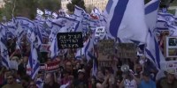 Israeli prime minister puts plan to overhaul judiciary on hold after protests