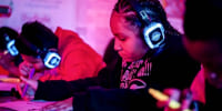 Reading with a Rapper helps students build skills through hip hop
