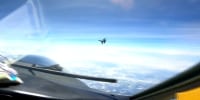 Video shows Chinese fighter jet flying in front of US military plane