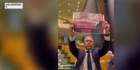 Israeli ambassador reacts to being escorted out of UN after protest
