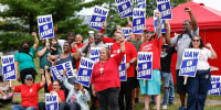 Autoworkers strike continues as Biden set to join picket line