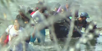 Latest surge of migrants at southern border overwhelms officials