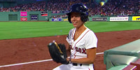 Dylan Dreyer tries her hand at fielding foul balls at Fenway