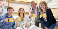 Family welcomes newborn to the world with Sunday Mug Shot