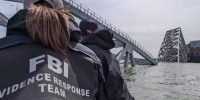 ‘It’s pretty much blackwater’: Baltimore bridge divers face zero visibility underwater