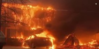 California residents flee home for second time as flames sweep in