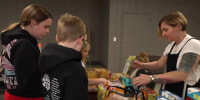 Group of women work to provide food to NY community amid shutdown