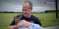 Oh deer: Indiana firefighters rescue baby deer from rushing floodwater