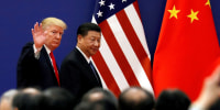 Image: President Donald Trump and China's President Xi Jinping meet business leaders at the Great Hall of the People in Beijing, China