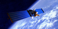 Image: A communication satellite orbits Earth.