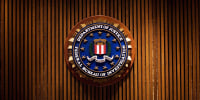 Image: A crest of the Federal Bureau of Investi