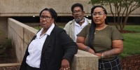 Marcus Smith's parents, Mary and George, and his sister, Kim Suber, outside of City Hall in Greensboro, N.C.