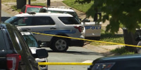 Officers outside the home of Malikah Diane Bennett in Charlotte, N.C.