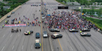 Image: Demonstrators shut down part of the Palmetto Expressway as they show their support for protests in Cuba on July 13, 2021 in Miami.