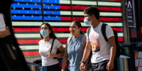 Image: People wear masks around Times Square, as cases of the infectious coronavirus Delta variant continue to rise in New York City, New York