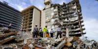 Search and rescue personnel work at the site of a collapsed Florida condominium complex in Surfside, Fla., on July 2, 2021.