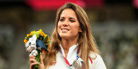 Image: Silver medalist Maria Andrejczyk, of Poland, poses on the podium during the medal ceremony for the women's javelin throw at the Summer Olympics on Aug. 7, 2021, in Tokyo.