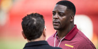 Former Washington Football Team running back Clinton Portis on the sidelines prior to an NFL preseason game on Aug. 15, 2019, at FedEx Field in Landover, Md.