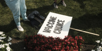 A sign during a protest against Covid-19 vaccination mandates in Lansing, Michi., on Aug. 6, 2021.