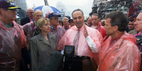 Image: Sen. Chuck Schumer speaks as Sen. Hillary Rodham Clinton, Mayor Giuliani and members of a congressional delegation look on during a visit on Sept. 20, 2001 to the scene of devastation where the World Trade Center's twin towers stood.
